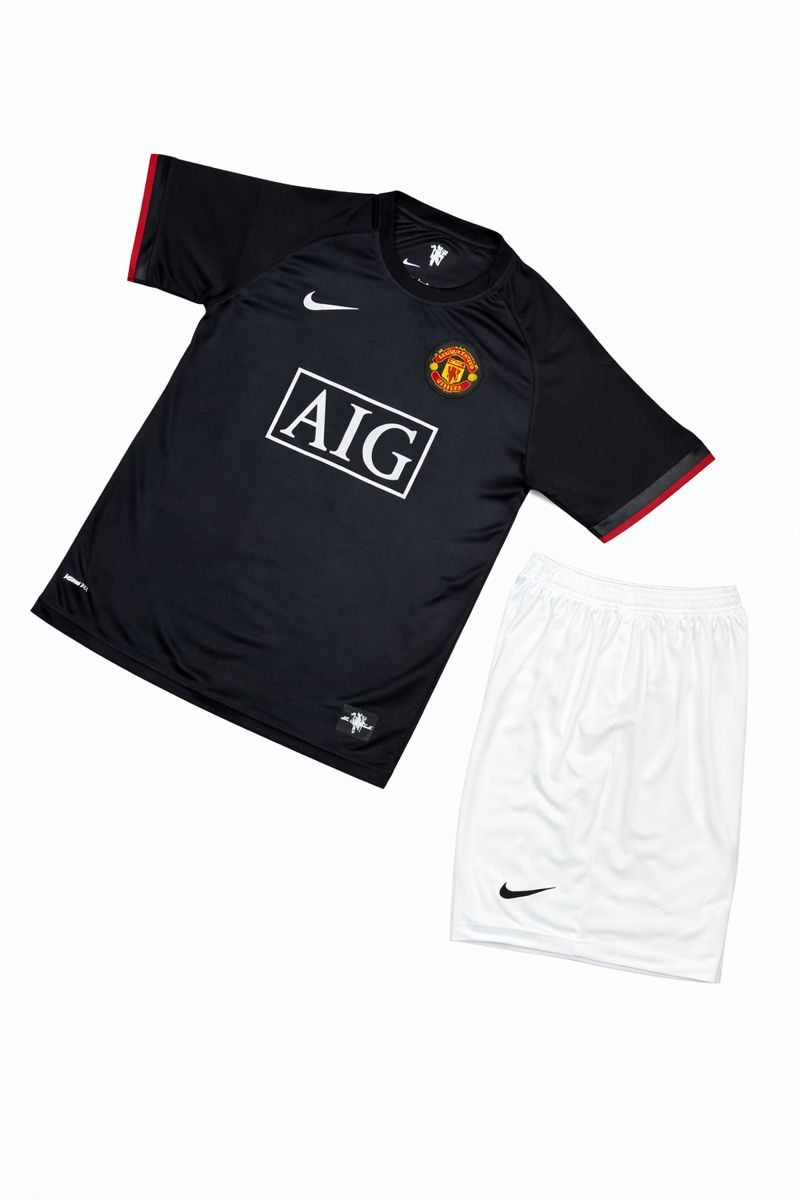 کیت منچستریونایتد مشکی AIG اورجینال| لباس دوم کلاسیک | ست پیراهن و شورت